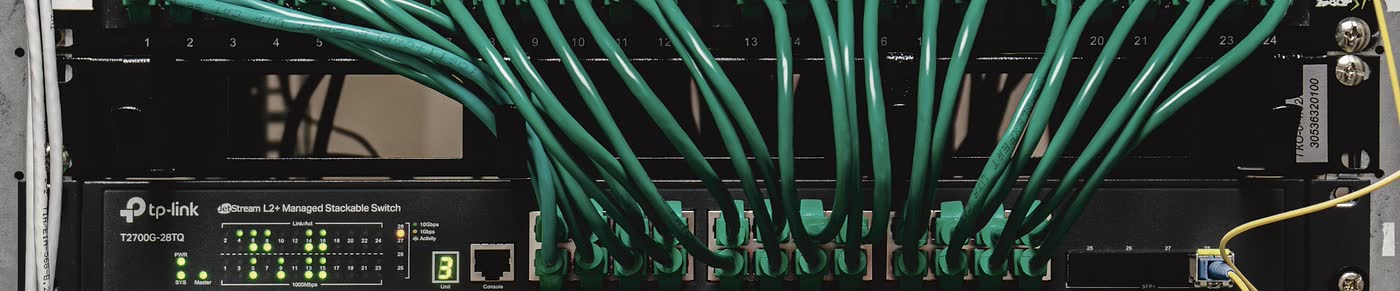 Switch ports with live link indicators across a rack